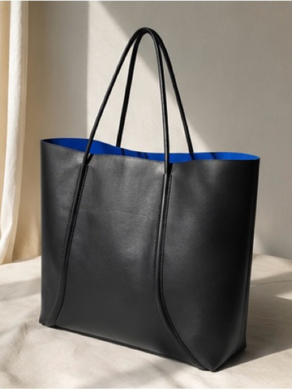 Minimalist Black Leather-Look Tote Bag with Cobalt Blue Interior - Picture 8 of 8